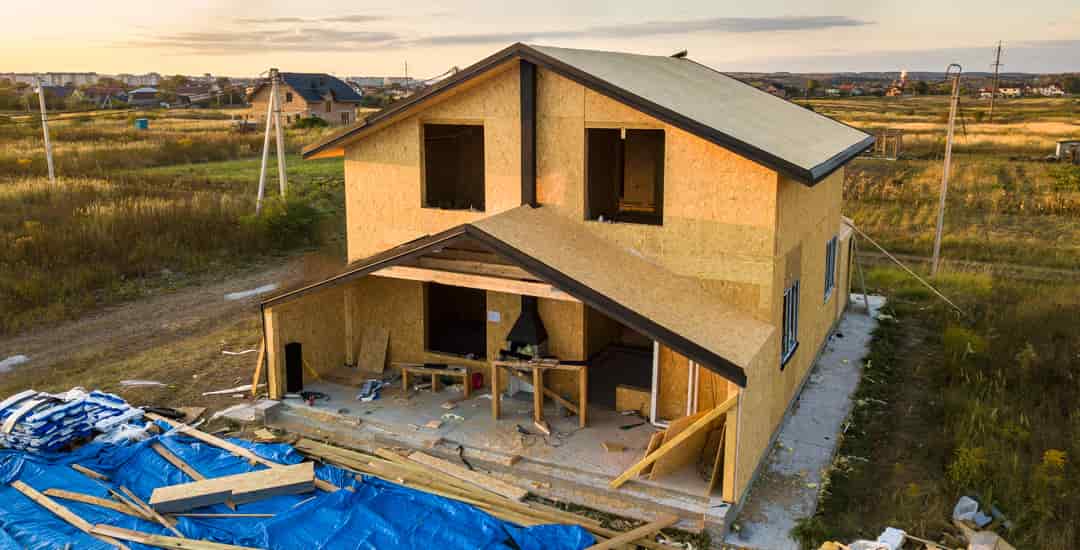 Casa prefabricada con porche de madera